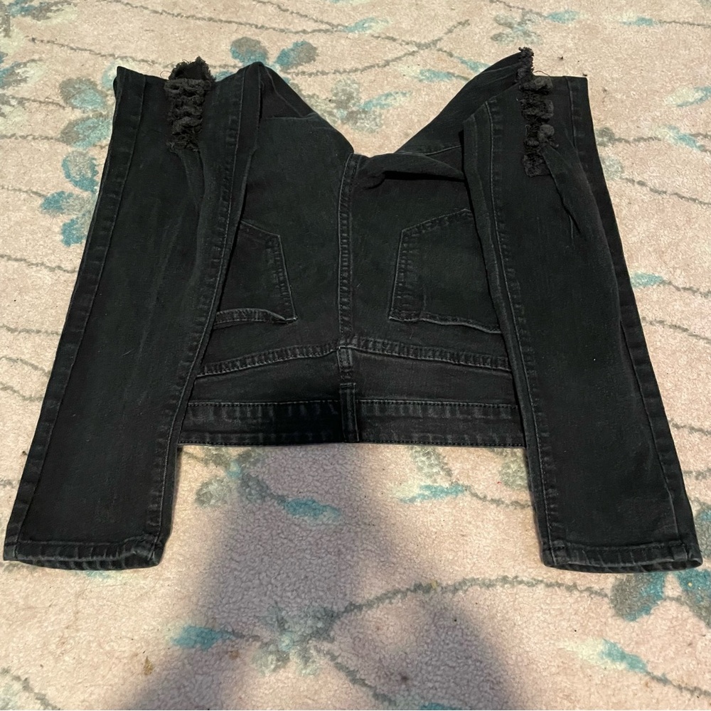Black distressed jeans with rips on the knees and a button fly - Picture 4 of 6